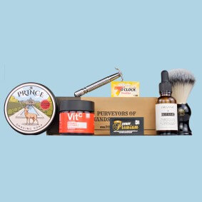 Shaving Subscription Box Full Kit January and February contents on blue background